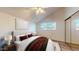 Bedroom with a neutral color scheme, vaulted ceiling, and ample natural light at 12445 N 21St Ave # 4, Phoenix, AZ 85029