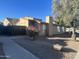 Charming home featuring a desert-landscaped front yard and a neutral-toned exterior in a pleasant residential neighborhood at 12445 N 21St Ave # 4, Phoenix, AZ 85029