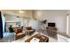 Open living space with vaulted ceilings, wood floors, and modern furniture at 12445 N 21St Ave # 4, Phoenix, AZ 85029