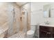 Elegant bathroom featuring tiled shower, modern fixtures, and a sleek vanity at 12745 W Calavar Rd, El Mirage, AZ 85335