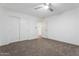 Bedroom with a closet and a doorway, offering versatile living space at 12745 W Calavar Rd, El Mirage, AZ 85335
