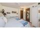 Bedroom featuring soft-green walls, carpet floors, and a ceiling fan at 13211 W Aleppo Dr, Sun City West, AZ 85375