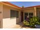 Quaint exterior featuring a covered entry and colorful landscaping at 13211 W Aleppo Dr, Sun City West, AZ 85375