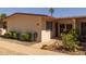Cozy single-story home with desert landscaping, covered entry, and red trim at 13211 W Aleppo Dr, Sun City West, AZ 85375