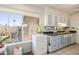 Bright kitchen with a window overlooking the private backyard area at 13211 W Aleppo Dr, Sun City West, AZ 85375