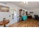 Efficient kitchen with white appliances and an adjacent dining area at 13211 W Aleppo Dr, Sun City West, AZ 85375