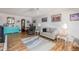 Comfortable living room with wood floors and neutral decor at 13211 W Aleppo Dr, Sun City West, AZ 85375