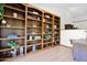 Custom built-in wooden bookshelves enhance this home's charm and organization at 1338 W Mountain View Dr, Mesa, AZ 85201