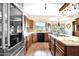 Kitchen featuring wood cabinets, stainless appliances, and a granite counter at 1338 W Mountain View Dr, Mesa, AZ 85201