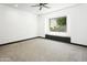 Empty bedroom with lots of natural light and a view to the outside at 14123 W Greentree S Dr, Litchfield Park, AZ 85340