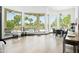 Bright dining room with golf course views, modern lighting, and comfortable seating at 14123 W Greentree S Dr, Litchfield Park, AZ 85340