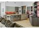 Open kitchen with large island with seating and modern stainless steel appliances at 14123 W Greentree S Dr, Litchfield Park, AZ 85340