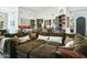 Spacious living room with open floor plan and a view to the kitchen and dining areas at 14123 W Greentree S Dr, Litchfield Park, AZ 85340