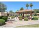 Inviting community gazebo with seating area and nearby barbecue grills at 14300 W Bell Rd # 100, Surprise, AZ 85374