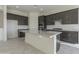 Beautiful kitchen with granite countertops, stainless steel appliances, and ample cabinet space at 16367 W Desert Mirage Dr, Surprise, AZ 85388