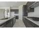 Beautiful kitchen with stainless steel appliances, granite countertops, and gas range at 16367 W Desert Mirage Dr, Surprise, AZ 85388