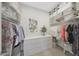 Spacious walk-in closet offering ample storage with organized shelving and hanging space at 18746 W Rancho Dr, Litchfield Park, AZ 85340