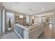 Inviting living room featuring stylish decor, a large comfortable couch, and abundant natural light at 18746 W Rancho Dr, Litchfield Park, AZ 85340