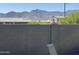 Backyard view showing a block wall and desert landscape at 18746 W Rancho Dr, Litchfield Park, AZ 85340