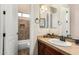 Bathroom featuring a single sink vanity, granite counters, and a shower and tub at 20139 E Via Del Oro --, Queen Creek, AZ 85142