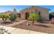 Inviting home with desert landscaping featuring a variety of cactus and stone walkway at 20139 E Via Del Oro --, Queen Creek, AZ 85142
