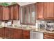 Well-equipped kitchen featuring granite counters, stainless steel appliances, and ample wood cabinetry at 20139 E Via Del Oro --, Queen Creek, AZ 85142