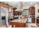 Gourmet kitchen featuring stainless steel appliances, granite countertops, and ample cabinetry at 20139 E Via Del Oro --, Queen Creek, AZ 85142