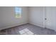 Cozy bedroom with neutral carpet, lots of natural light and a large closet at 20234 W Catalina Dr, Buckeye, AZ 85396