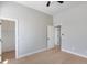 Spacious bedroom featuring hardwood floors and neutral paint at 21663 N 57Th Ave, Glendale, AZ 85308
