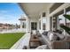 Stylish patio features ample seating, water views and easy access to indoor living spaces at 21663 N 57Th Ave, Glendale, AZ 85308