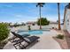 Backyard pool and waterfront offer a refreshing oasis for relaxation and recreation at 21663 N 57Th Ave, Glendale, AZ 85308