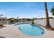 Backyard pool and waterfront views create a private resort-like experience at 21663 N 57Th Ave, Glendale, AZ 85308
