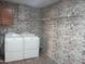Laundry area with front loading washer and dryer at 2324 W Via Rialto Cir, Mesa, AZ 85202