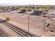 Expansive property featuring a large fenced lot and well-maintained homes in a peaceful rural setting at 23717 N Mustang Way, Florence, AZ 85132