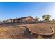Expansive backyard showcases the spacious outdoor area, highlighting the property's size at 23717 N Mustang Way, Florence, AZ 85132
