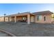 The covered patio offers an ideal space for outdoor relaxation and entertainment at 23717 N Mustang Way, Florence, AZ 85132