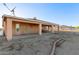 View of the house featuring a large covered patio perfect for outdoor entertaining at 23717 N Mustang Way, Florence, AZ 85132
