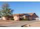 Single-Gathering house with solar panels and a long driveway; desert landscaping at 23717 N Mustang Way, Florence, AZ 85132