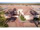 Beautiful home featuring a red brick walkway, manicured landscaping, and charming entrance features at 23717 N Mustang Way, Florence, AZ 85132