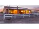 Large covered patio offering a comfortable outdoor space with sunset views at 23717 N Mustang Way, Florence, AZ 85132