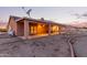 Cozy covered patio perfect for outdoor dining and relaxing with a ceiling fan at 23717 N Mustang Way, Florence, AZ 85132