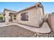 Charming home exterior with a covered patio and meticulously landscaped yard, offering great curb appeal at 2462 W Turtle Hill Dr, Anthem, AZ 85086