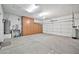 Well-maintained garage with ample space, storage cabinets, and a clean interior, offering practicality and convenience at 2462 W Turtle Hill Dr, Anthem, AZ 85086