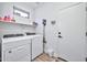 Clean and bright laundry room with modern washer and dryer at 2462 W Turtle Hill Dr, Anthem, AZ 85086