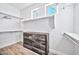 Well-organized walk-in closet with built-in shelving and drawers at 2462 W Turtle Hill Dr, Anthem, AZ 85086