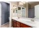 Bathroom featuring double sinks, updated fixtures, and a stylish vanity with plenty of space at 2489 E Sequoia Dr, Chandler, AZ 85286
