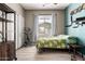 Bedroom featuring natural light and an exercise machine, perfect for a home gym setup at 2489 E Sequoia Dr, Chandler, AZ 85286