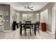Bright dining room with large windows and classic table and chairs at 2489 E Sequoia Dr, Chandler, AZ 85286