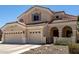 Charming two-story home featuring a three-car garage and a welcoming tiled roof at 2489 E Sequoia Dr, Chandler, AZ 85286