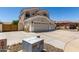 A charming two-story home with a three-car garage showcasing its ample parking at 2489 E Sequoia Dr, Chandler, AZ 85286